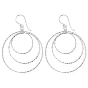 Stunning Circles Dangling Earrings Absolutely Stunning Circles Dangling Earrings.  These Stunning Circles Dangling Earrings have 3 hoops of twisted silver. All set within each other gradating down in size. Each piece moves independently giving a super effect.  They are 3 1/2 cm x 5 cm incl hooks and have a very high polish so they look Amazing on.  Best Seller.